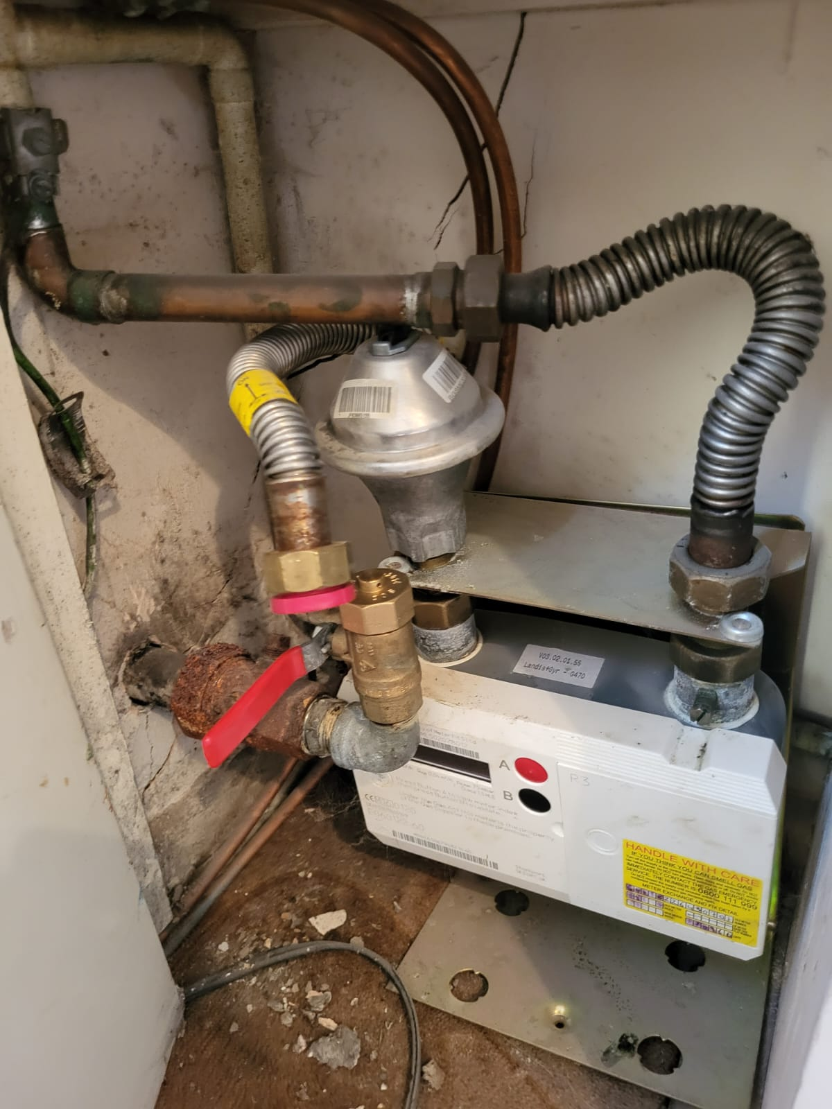 Gas engineer performing safety checks
